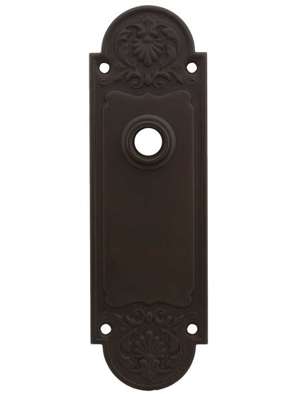 Regency Style Stamped-Brass Back Plate in Oil-Rubbed Bronze.